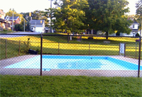 Swimming pool behind a fence