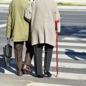 Elderly couple on crosswalk