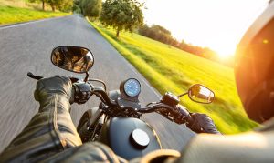 Motorcycle riding down open road