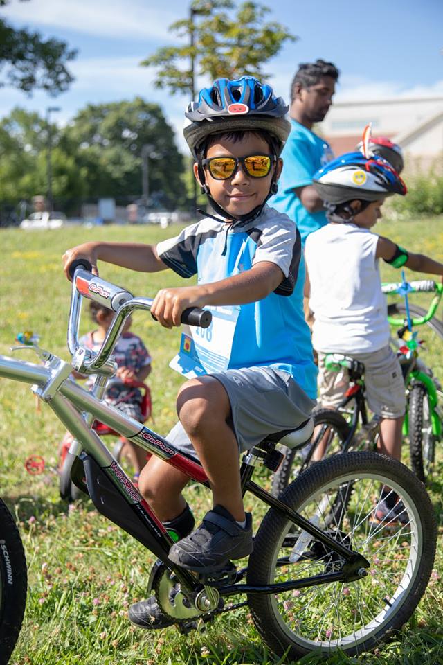 Little boy riding bike at Mattapan on Wheels 2018 