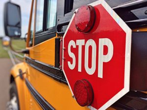 School bus with stop sign and lights