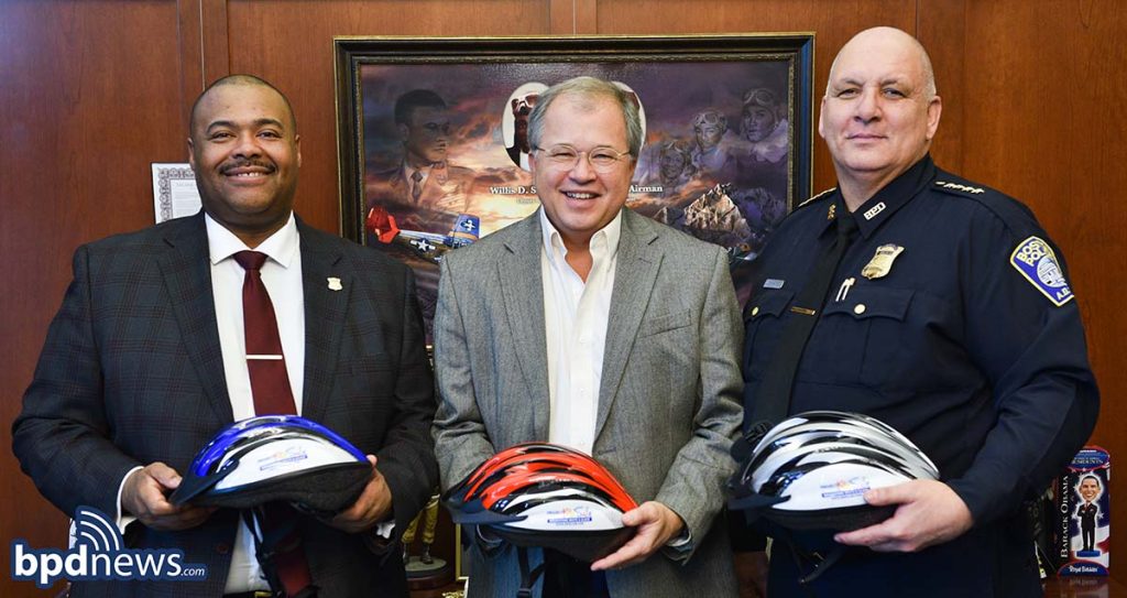 Boston Police Department bike safety and bicycle helmet donation from Breakstone, White & Gluck of Boston