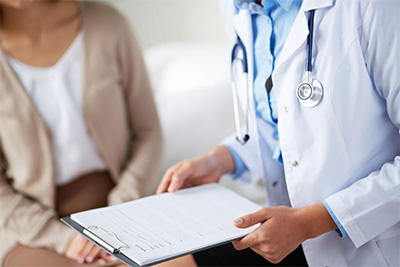 doctor with a patient at a Boston hospital