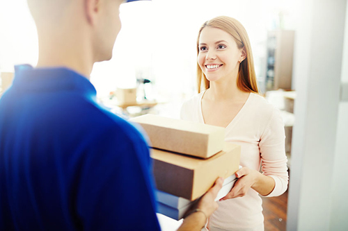 Delivery man with online purchase