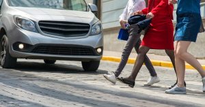 Driver stops for pedestrians in Boston