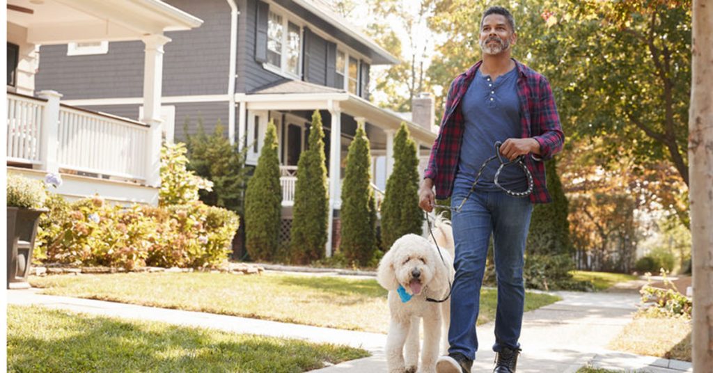 Man walking his dog on a leash