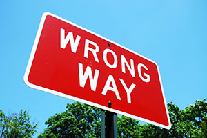Wrong way sign alerts drivers they are traveling in the wrong direction and may cause a head-on car crash