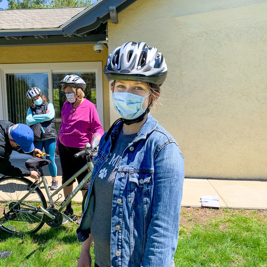 Girl wearing Project KidSafe bicycle helmet donated by Breakstone, White & Gluck.