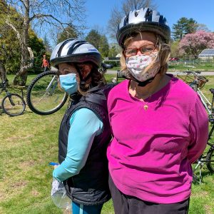 Women wearing Project KidSafe bicycle helmets at Basic Bike Maintenance Class at Dedham Public Library.