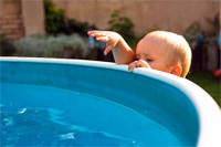 pool-child-reaching-over-200.jpg